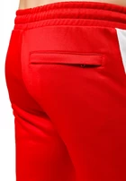 Штаны спортивные мужские Puma Iconic T7 Track Pants PT красного цвета