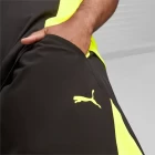 Спортивные шорты мужские Puma Ultrabreathe 7' Woven Short черно-желтого цвета