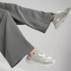Спортивні штани жіночі Puma CLASSICS+ Relaxed Sweatpants сірого кольору