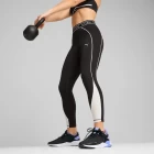 Тайтсы женские Puma FIT STRONG 7/8 TIGHT черного цвета