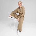 Худи женское Puma CLASSICS+ Relaxed Hoodie бежевого цвета