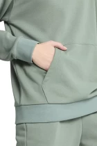 Спортивний костюм жіночий PUMA Relaxed Sweat Suit TR cl Green Moon м'ятного кольору