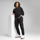 Спортивные штаны женские PUMA ESS ELEVATED Sweatpants черного цвета