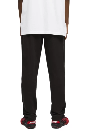 Спортивні штани чоловічі PUMA F1 Sweatpants Relaxed чорного кольору