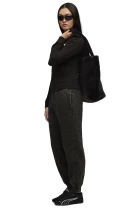 Штаны спортивные женские PUMA ESS ELEVATED Wash Sweatpants черного цвета