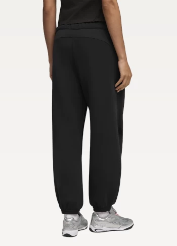 Спортивні штани жіночі PUMA PUMATECH SENSE Pants DK cl чорного кольору