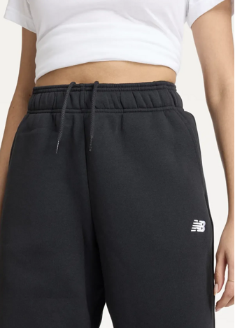 Штани жіночі New Balance Essentials Fleece чорного кольору