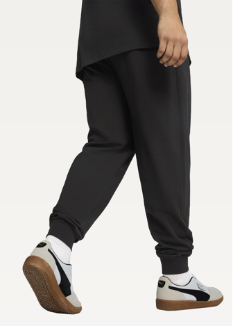 Штани спортивні чоловічі PUMA ESS No. 1 Logo Jersey Pants з манжетами чорного кольору