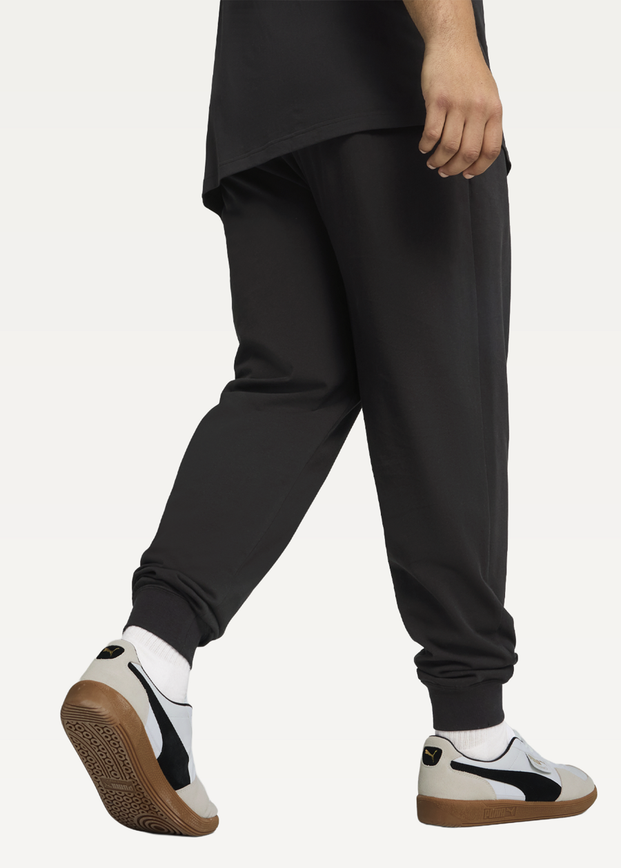 Штани спортивні чоловічі PUMA ESS No. 1 Logo Jersey Pants з манжетами чорного кольору