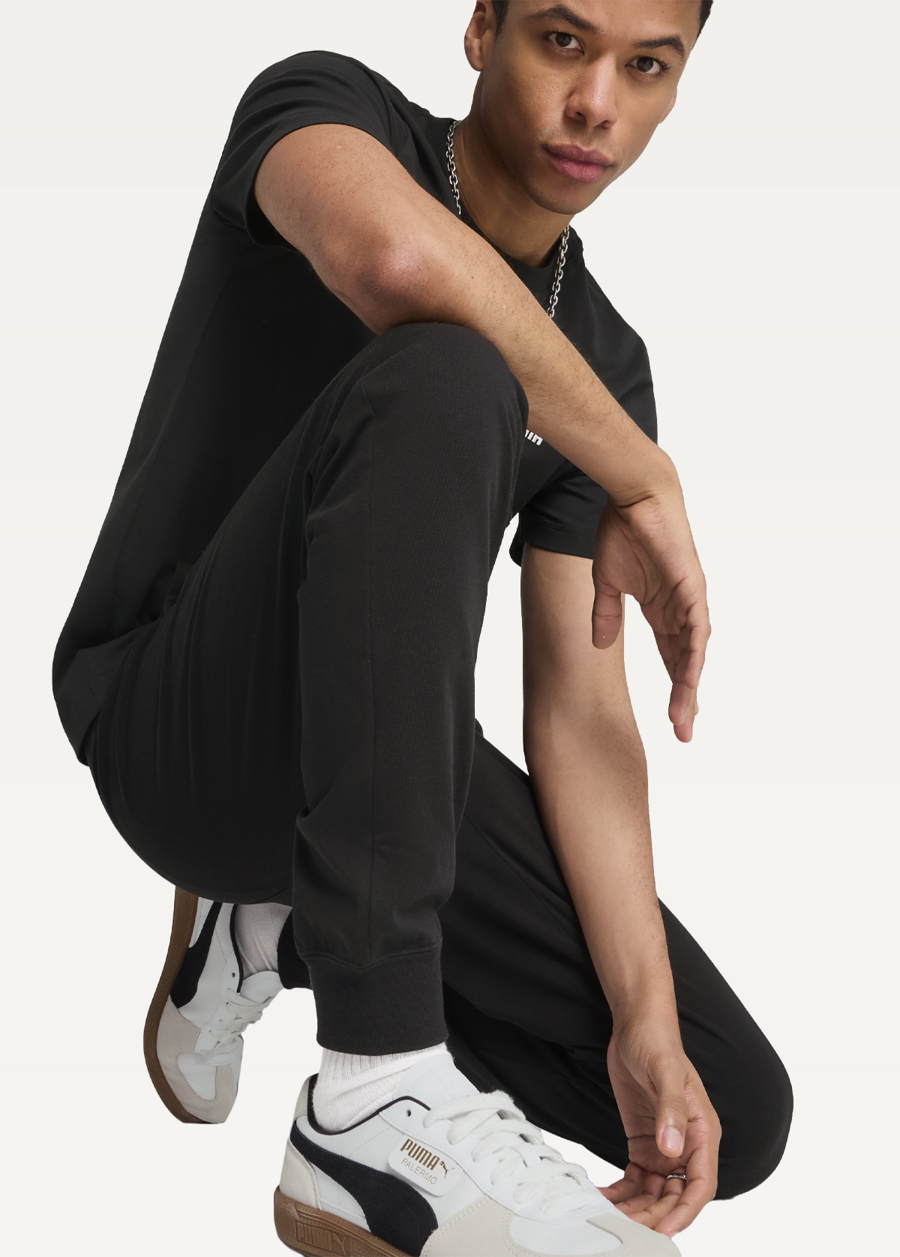 Штани спортивні чоловічі PUMA ESS No. 1 Logo Jersey Pants з манжетами чорного кольору