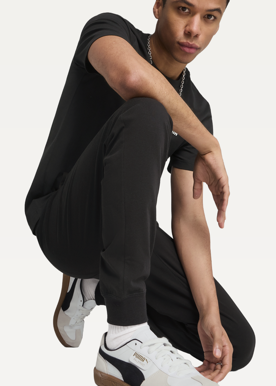 Штани спортивні чоловічі PUMA ESS No. 1 Logo Jersey Pants з манжетами чорного кольору
