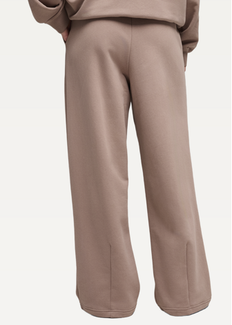 Спортивні штани жіночі PUMA Peach Touch Sweatpants Sandstone