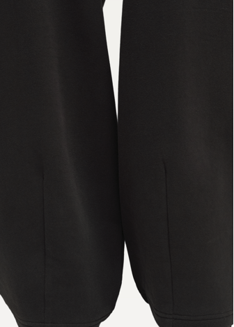 Спортивні штани жіночі PUMA Peach Touch Sweatpants чорного кольору