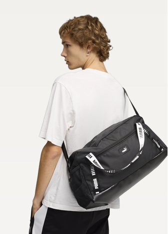 Спортивна сумка PUMA PHASE TAPE Small Sports чорного кольору
