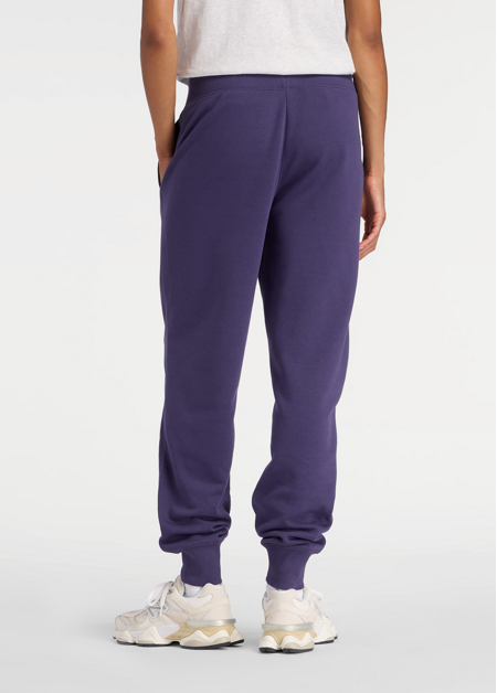 Штаны женские New Balance Sport French Terry Graphic Jogger фиолетового цвета