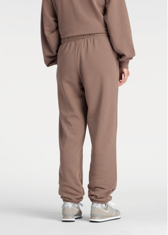 Штани жіночі New Balance Sport Essentials French Terry Jogger шоколадного кольору