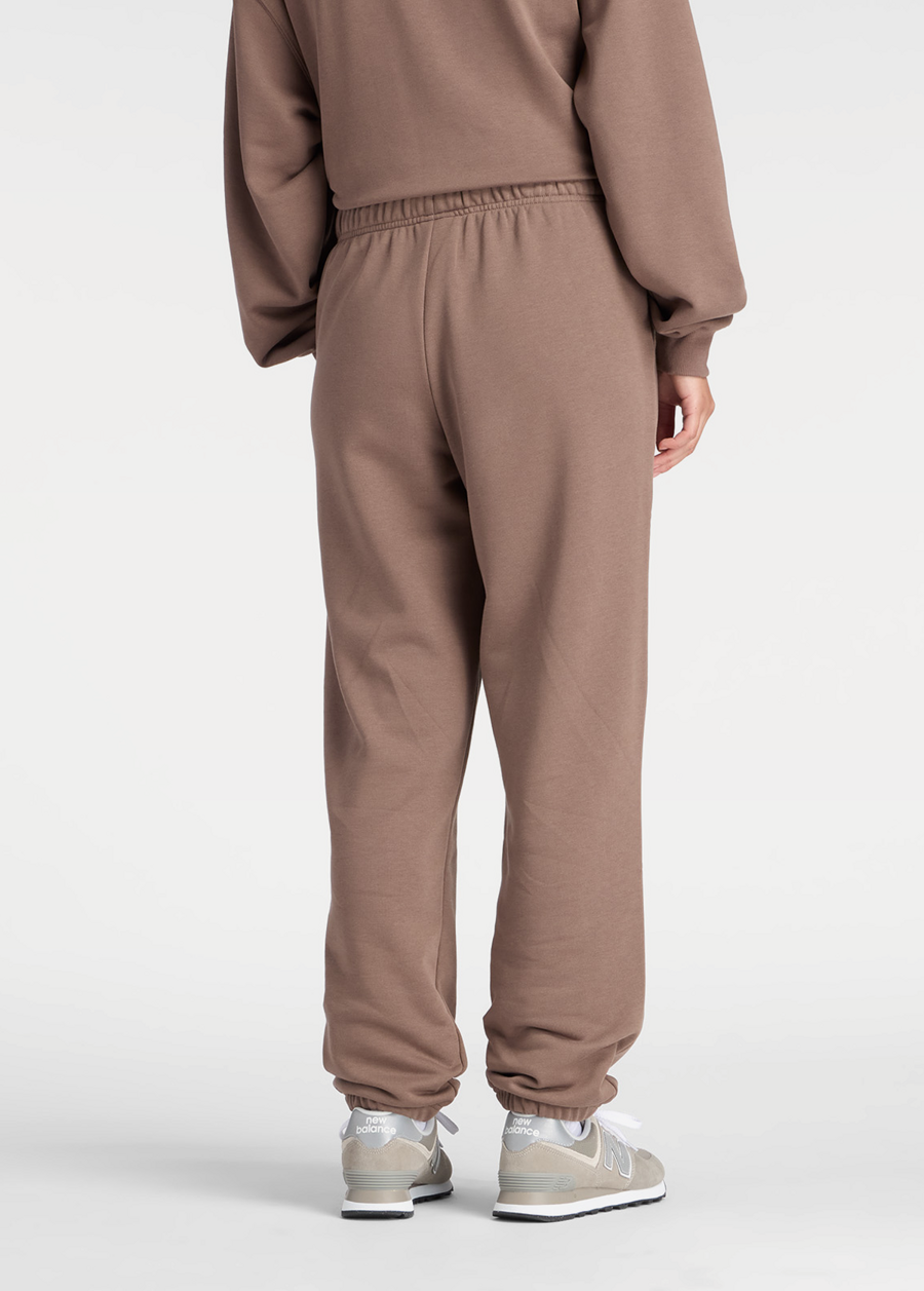 Штани жіночі New Balance Sport Essentials French Terry Jogger шоколадного кольору