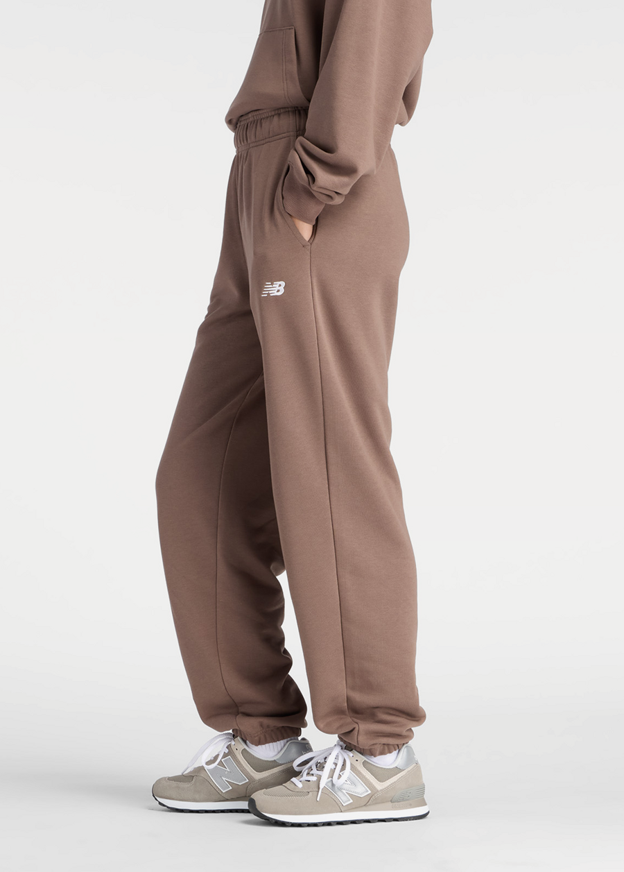 Штани жіночі New Balance Sport Essentials French Terry Jogger шоколадного кольору