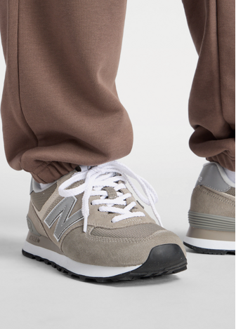 Штани жіночі New Balance Sport Essentials French Terry Jogger шоколадного кольору