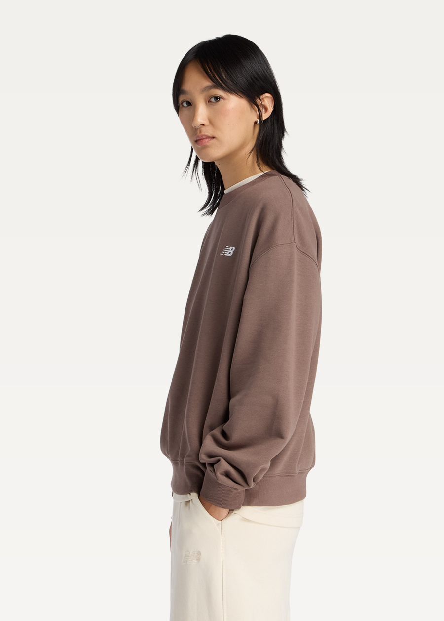 Світшот жіночий New Balance Sport Essentials French Terry Crew шоколадного кольору