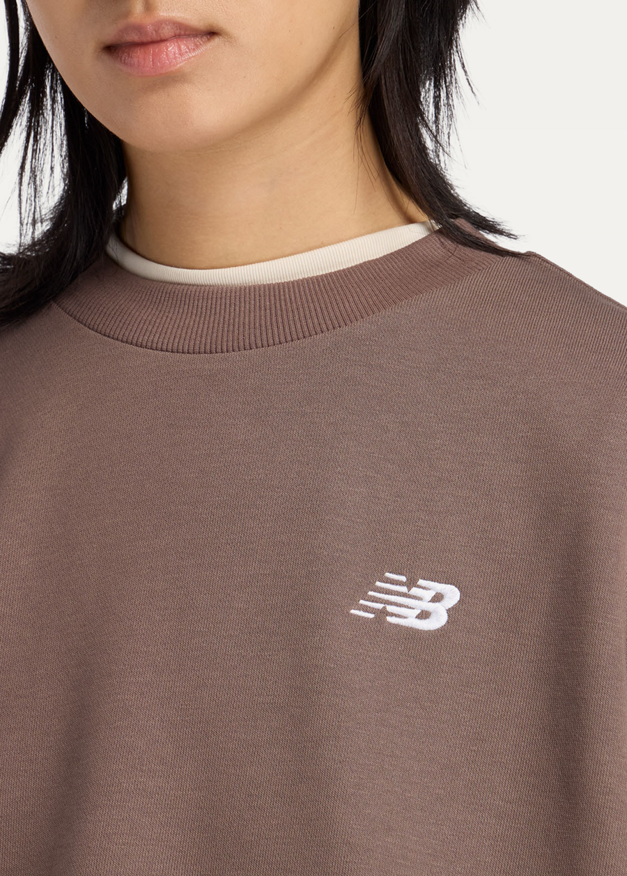 Світшот жіночий New Balance Sport Essentials French Terry Crew шоколадного кольору