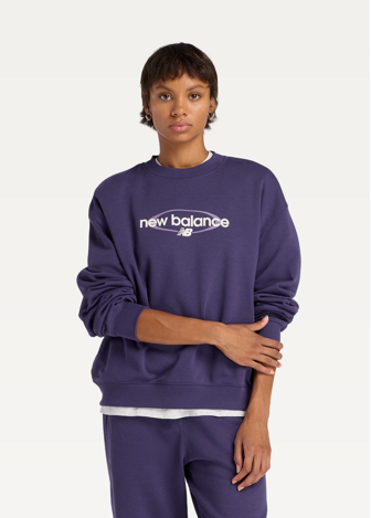 Світшот жіночий New Balance Sport Graphic Oversized Crew фіолетового кольору