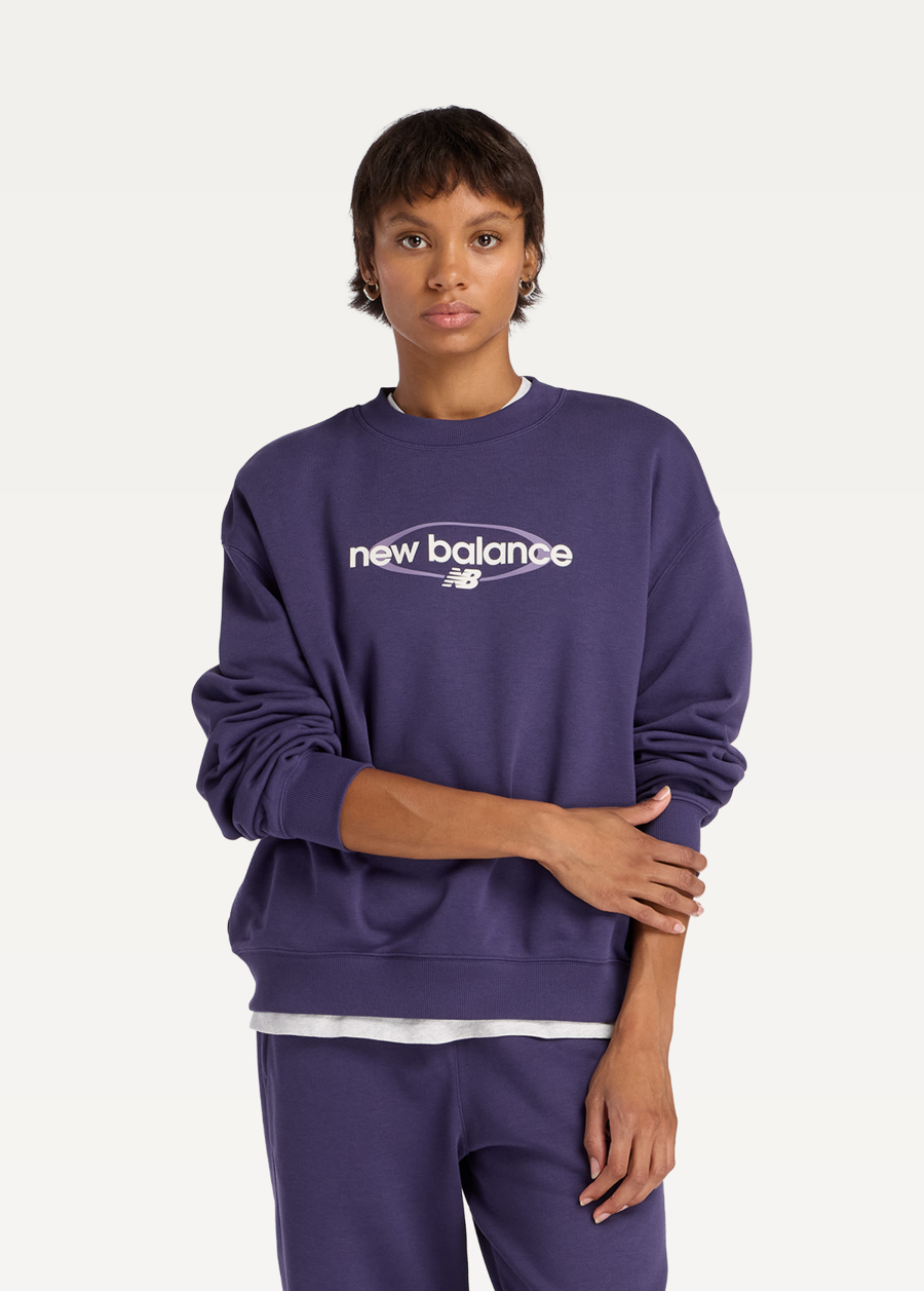 Світшот жіночий New Balance Sport Graphic Oversized Crew фіолетового кольору