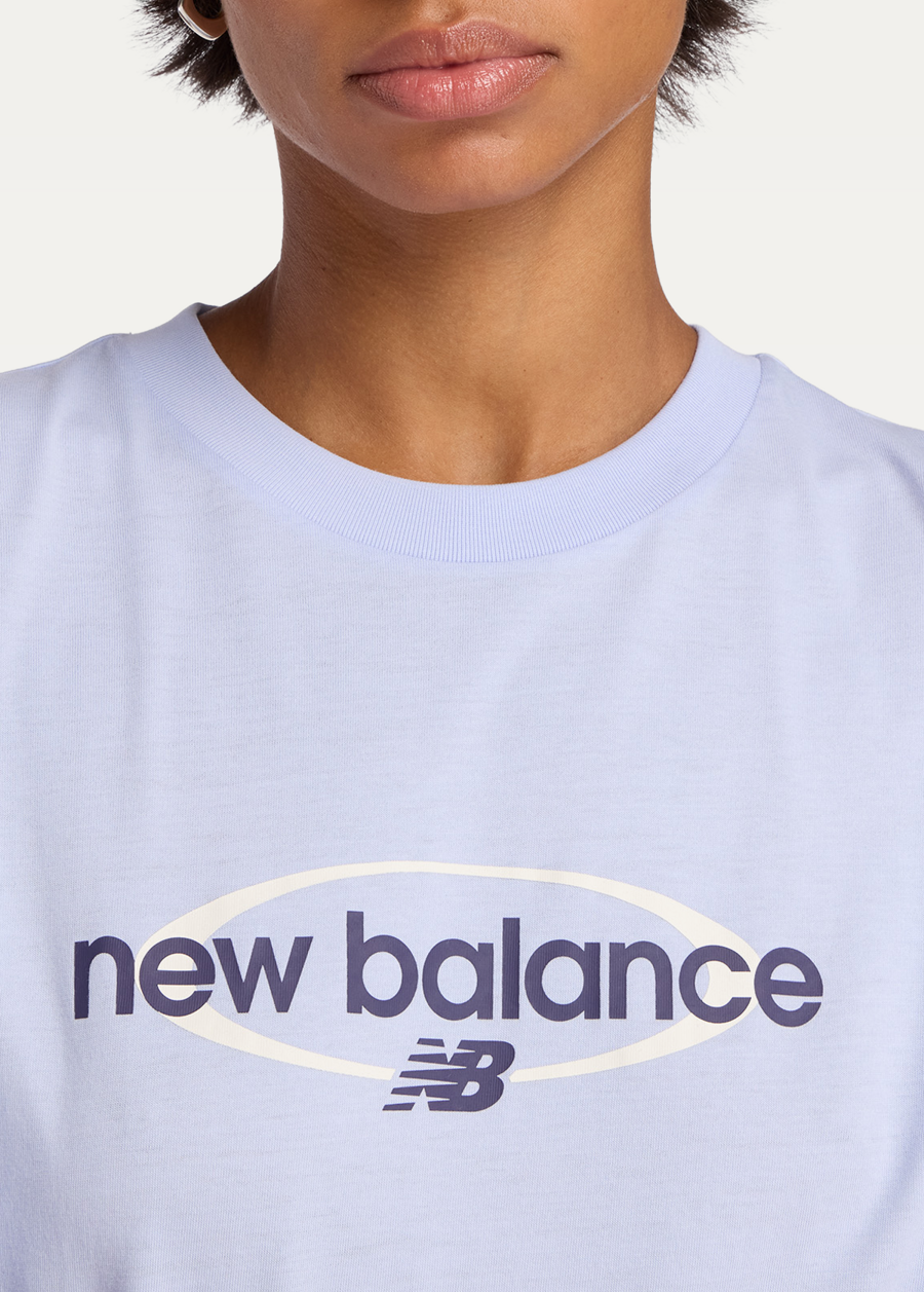 Футболка жіноча New Balance Sport Relaxed Graphic бузкового кольору