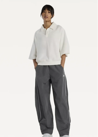 Футболка жіноча New Balance Coastal Fleece Oversized Polo бежевого кольору