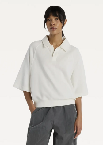 Футболка жіноча New Balance Coastal Fleece Oversized Polo бежевого кольору