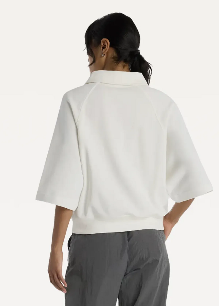 Футболка жіноча New Balance Coastal Fleece Oversized Polo бежевого кольору