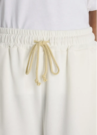 Шорти жіночі New Balance Coastal Fleece Bermuda Short молочного кольору