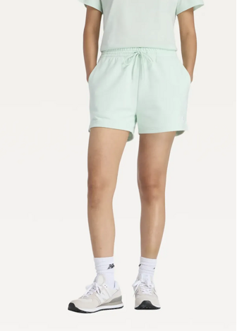 Шорти жіночі New Balance Sport Essentials French Terry м'ятного кольору