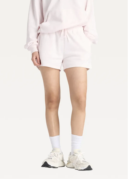 Шорти жіночі New Balance Sport Essentials French Terry світло-рожевого кольору