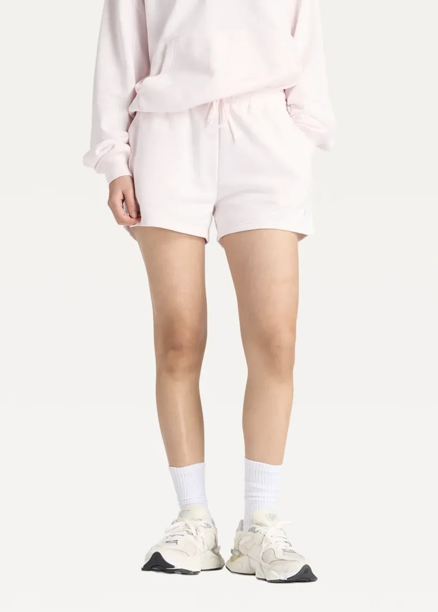 Шорти жіночі New Balance Sport Essentials French Terry світло-рожевого кольору