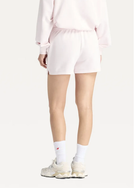 Шорти жіночі New Balance Sport Essentials French Terry світло-рожевого кольору
