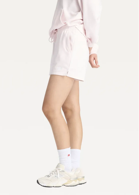 Шорти жіночі New Balance Sport Essentials French Terry світло-рожевого кольору