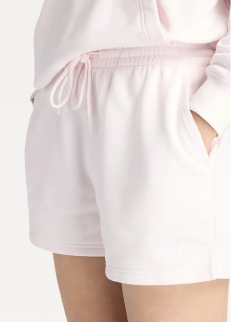 Шорти жіночі New Balance Sport Essentials French Terry світло-рожевого кольору