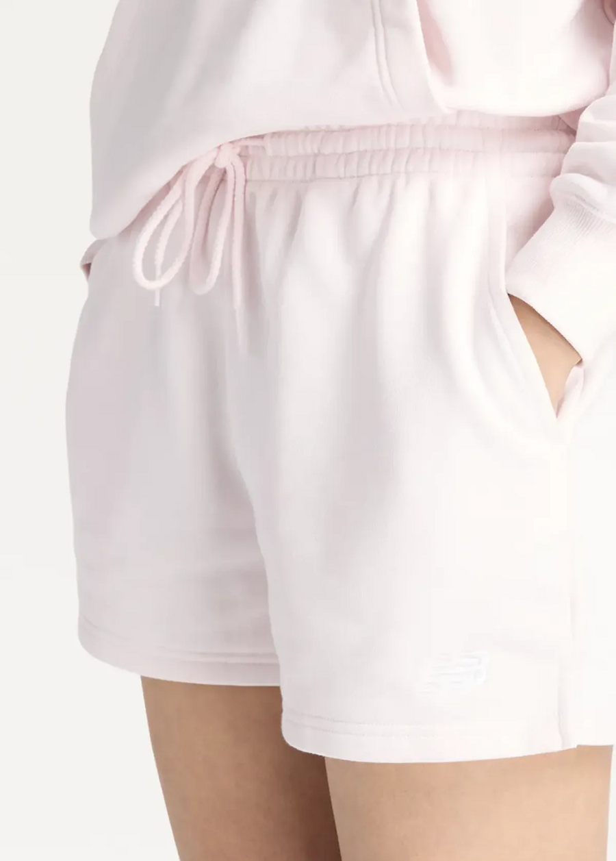 Шорти жіночі New Balance Sport Essentials French Terry світло-рожевого кольору