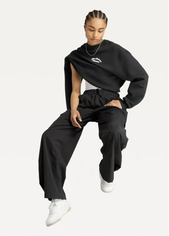 Штани жіночі New Balance Cargo Pants чорного кольору