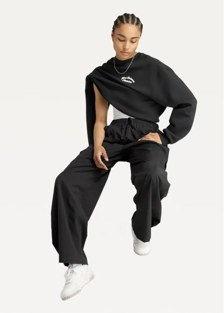 Штани жіночі New Balance Cargo Pants чорного кольору