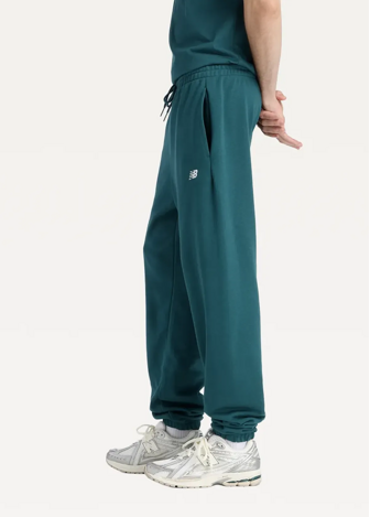 Штани чоловічі New Balance Essentials French Terry зеленого кольору