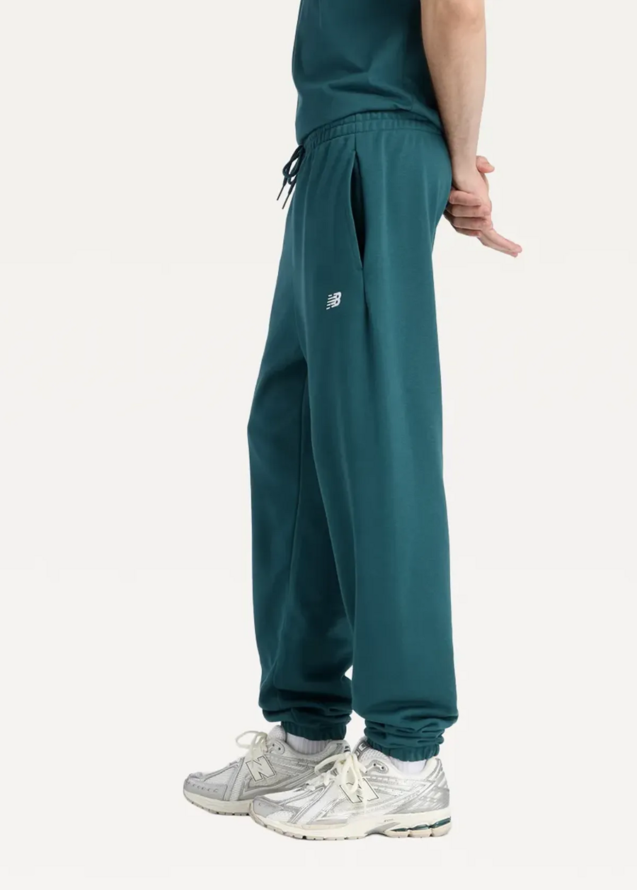 Штани чоловічі New Balance Essentials French Terry зеленого кольору