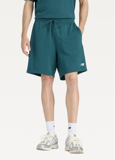 Шорти чоловічі New Balance Sport Essentials French Terry 7" зеленого кольору