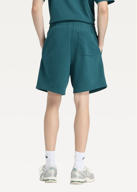 Шорти чоловічі New Balance Sport Essentials French Terry 7" зеленого кольору