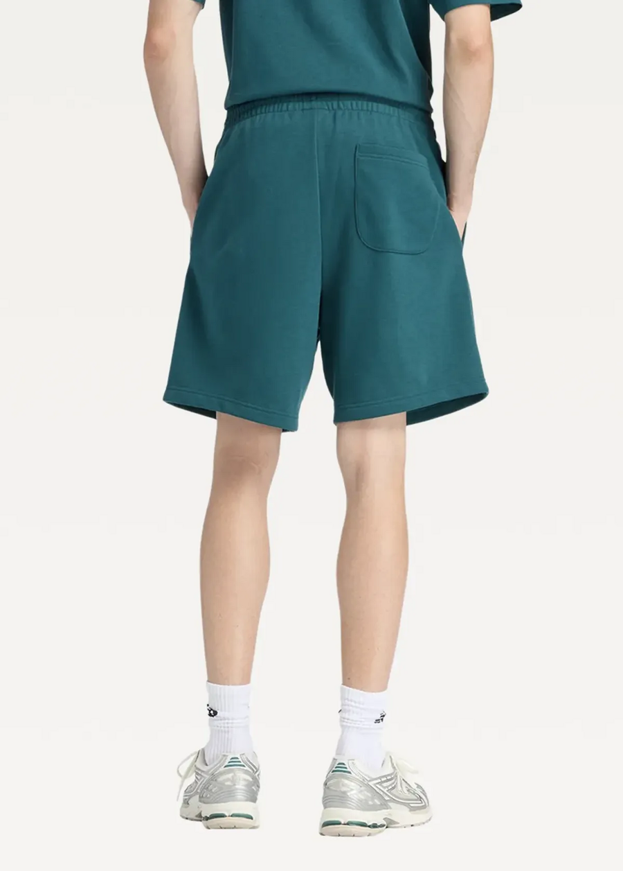 Шорти чоловічі New Balance Sport Essentials French Terry 7" зеленого кольору