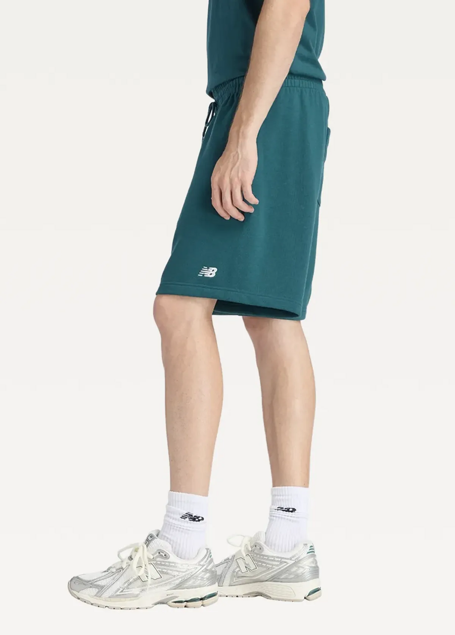 Шорти чоловічі New Balance Sport Essentials French Terry 7" зеленого кольору