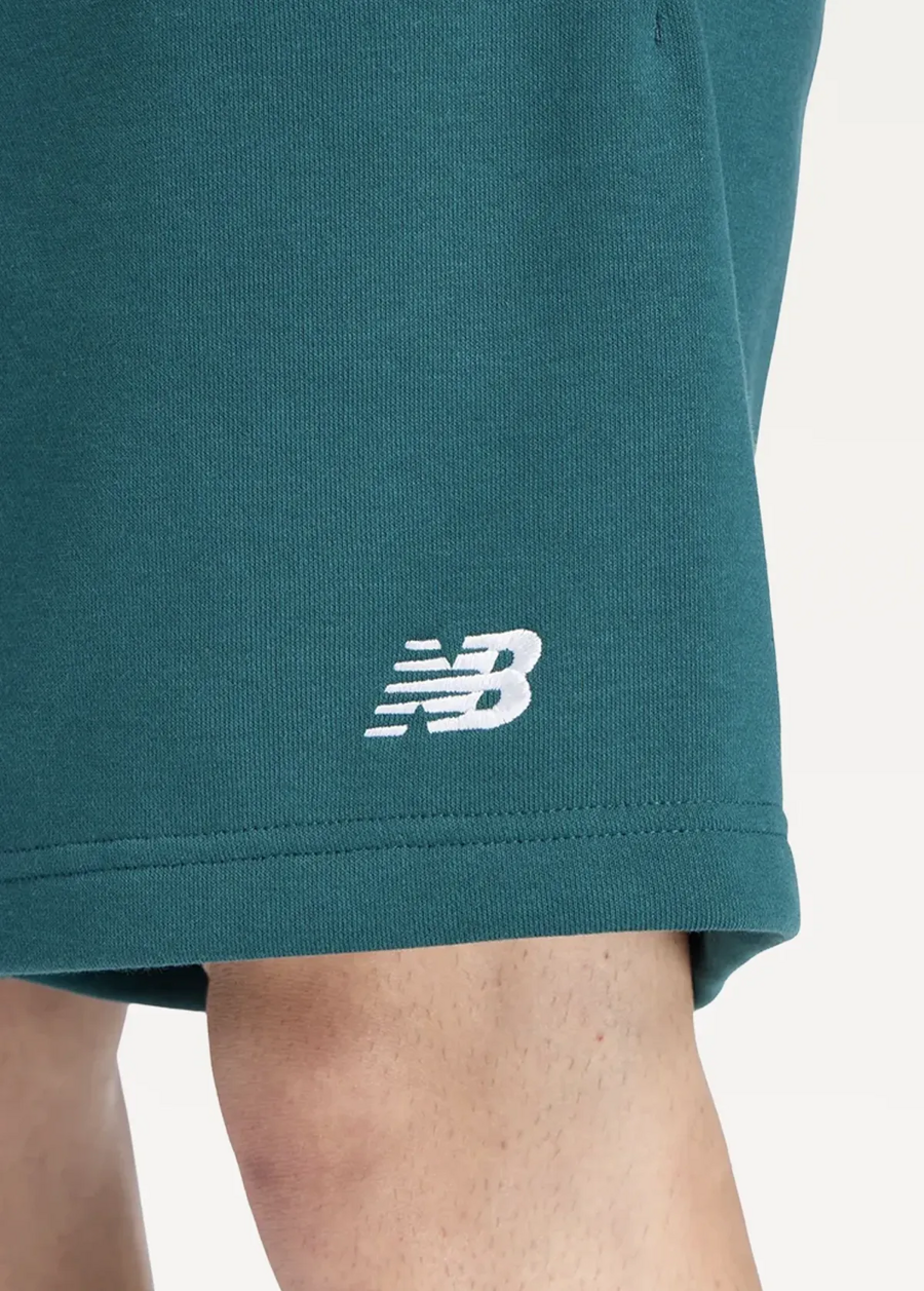 Шорти чоловічі New Balance Sport Essentials French Terry 7" зеленого кольору
