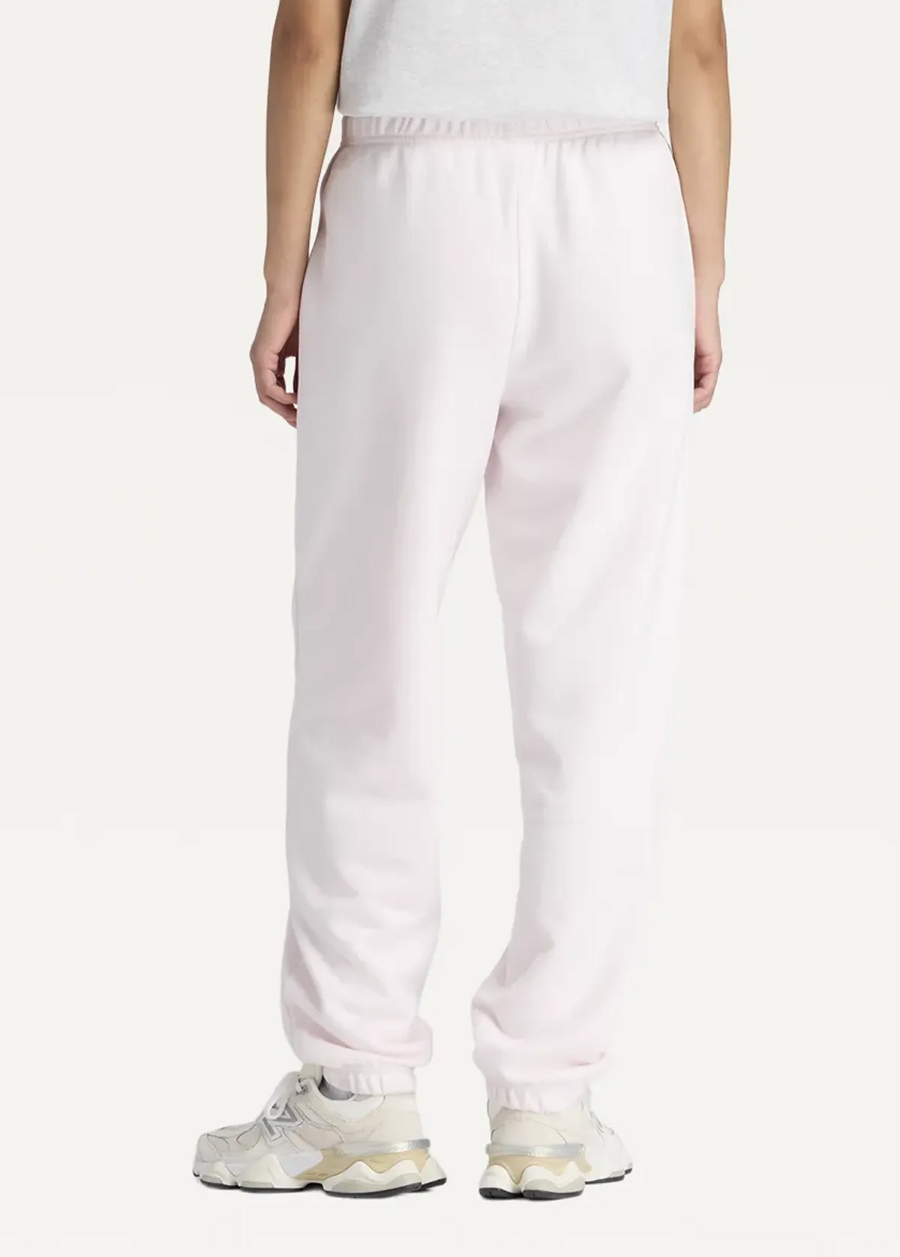 Штани жіночі New Balance Sport Essentials French Terry Jogger світло-рожевого кольору