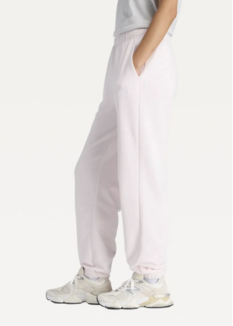Штани жіночі New Balance Sport Essentials French Terry Jogger світло-рожевого кольору
